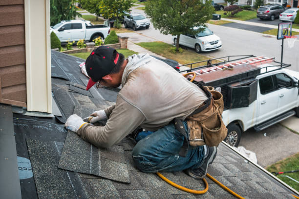 Professional Roofing technician working in Simla, CO